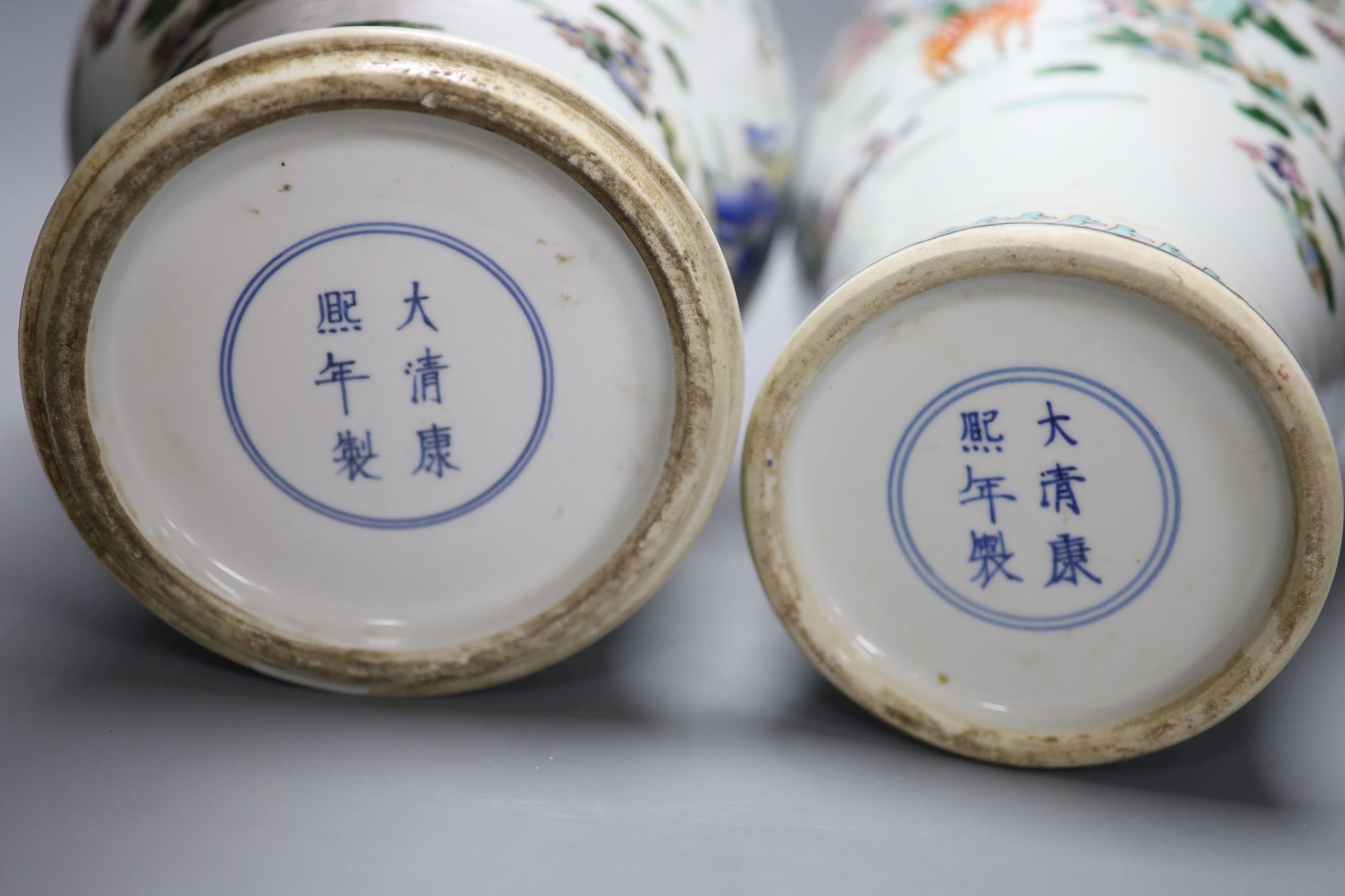 Two Chinese famille rose vases and covers, tallest 47cm